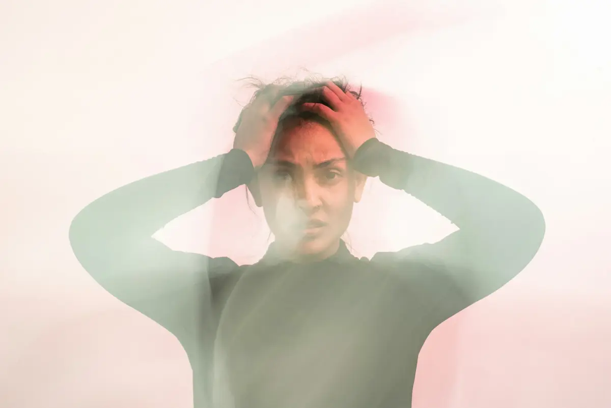 Person experiencing and managing anxiety symptoms