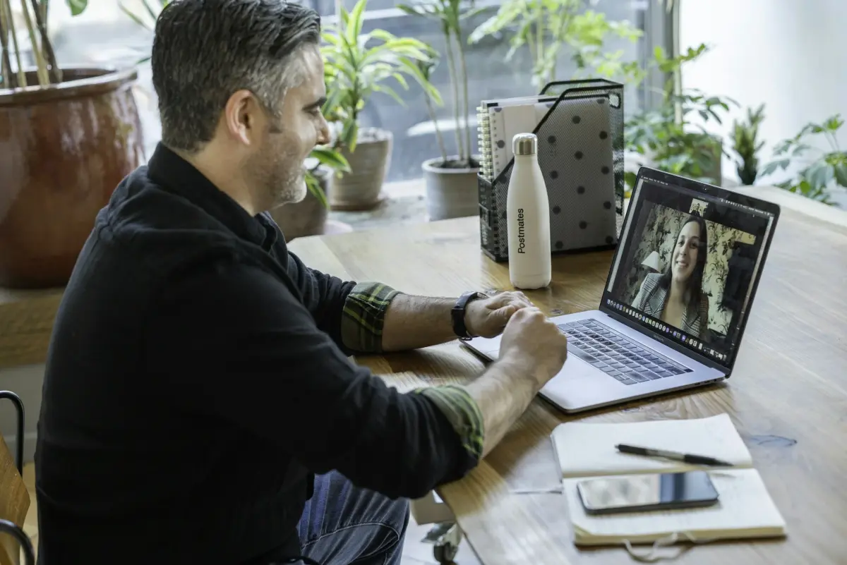 Person starting their first online therapy session with a clinical psychologist