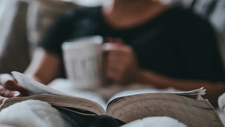 Person taking a moment to pause and breathe, finding calm amid daily pressures